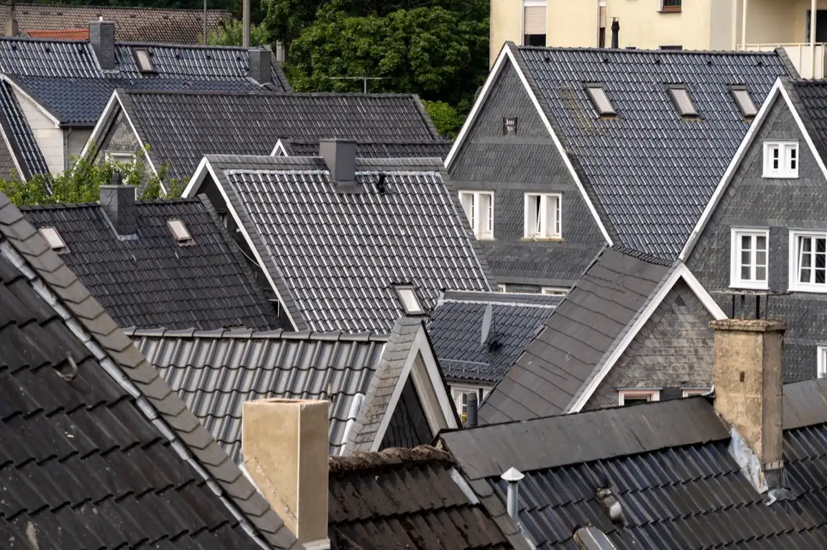 Steep roof eaves and gutter lines on houses in Terre Haute, IN
