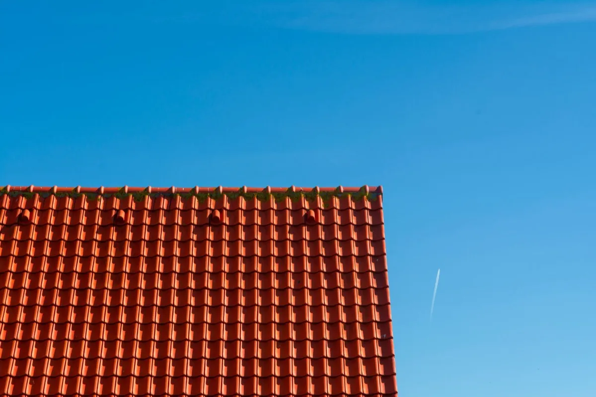 Tile roof gable in full sun, the kind of exposure that sets roof life in Terre Haute, IN
